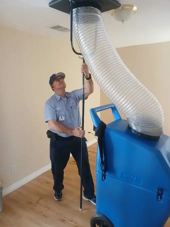 HVAC Installation technician using HEPA equipment in Cody